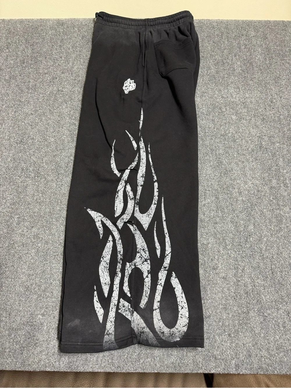 Men's Black Wide-Leg Sweatpants with Silver Tribal Side Graphics